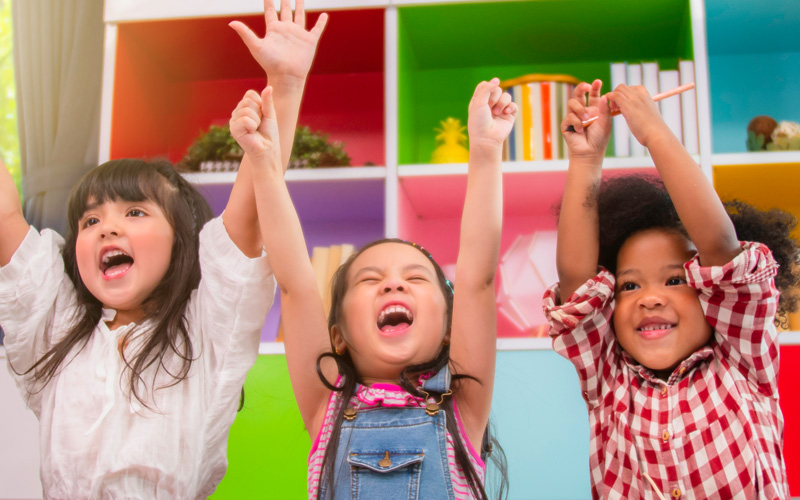 preschool age children shouting in joy